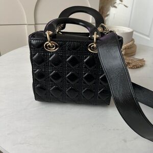 Cannage black purse
